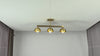 Customizable linear dome ceiling light video displaying illuminated three-light design for dining room, kitchen, hallway, and bedroom interiors