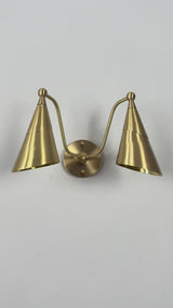 Aurelia double cone wall sconce video showing brass finish, two tapered cone shades, curved arms, warm downward glow, and elegant wall-mounted design by Brass Leaf Studio