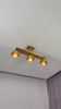 Solid brass 3-light semi flush mount ceiling fixture video showing linear bar, dome shades, and warm downward lighting effect