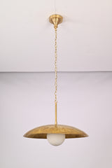 Raw brass dome disc pendant light with opal glass globe for dining room, kitchen island, and ceiling lighting