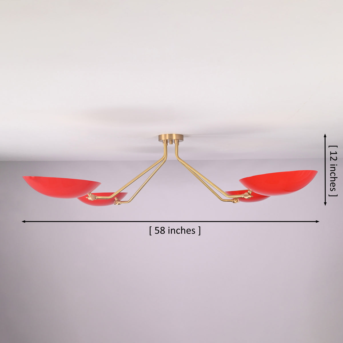 Sculptural red disc flush mount chandelier in solid brass showing 58 inch width and 12 inch height with minimalist bowl shade design.