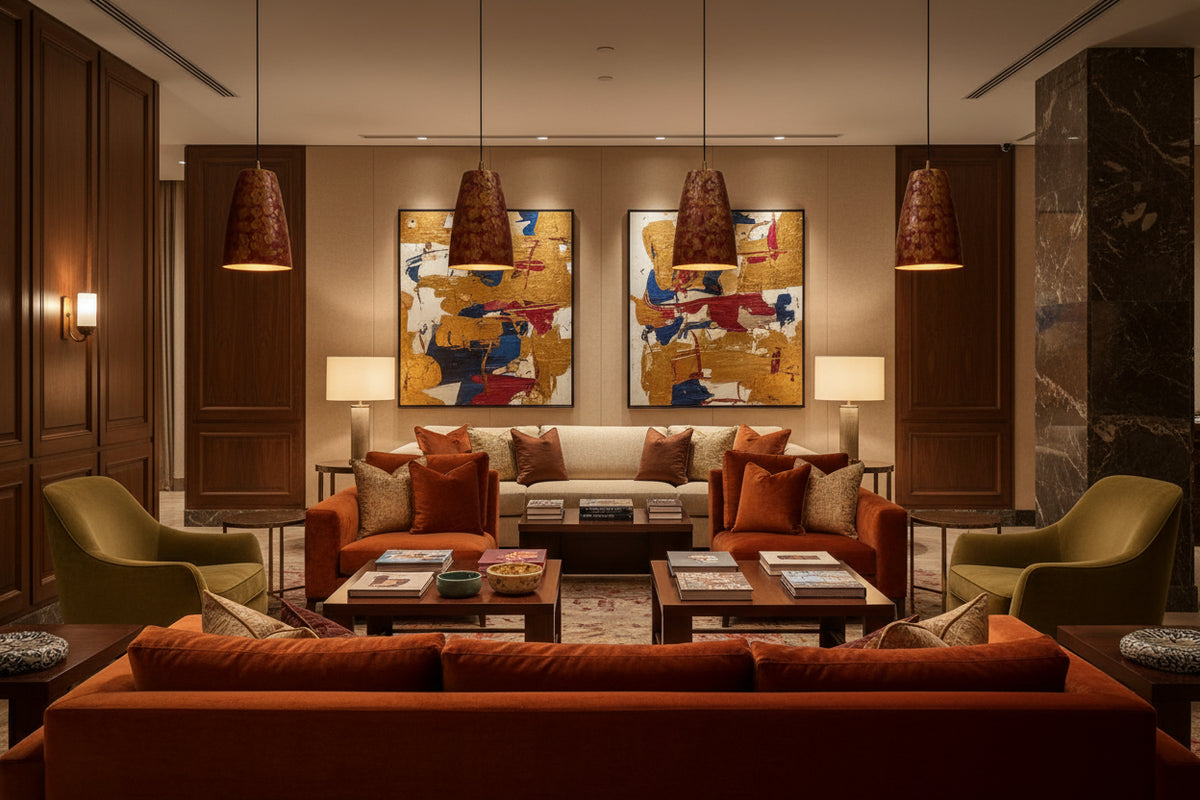 Red patterned copper pendant lamp shown illuminated with warm downward light and decorative shade texture