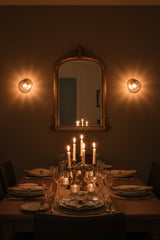 Ribbed glass bedroom wall sconce with warm light diffusion and elegant round globe design