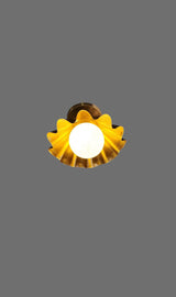 Bottom view of ruffled brass flushmount ceiling light with glowing globe bulb