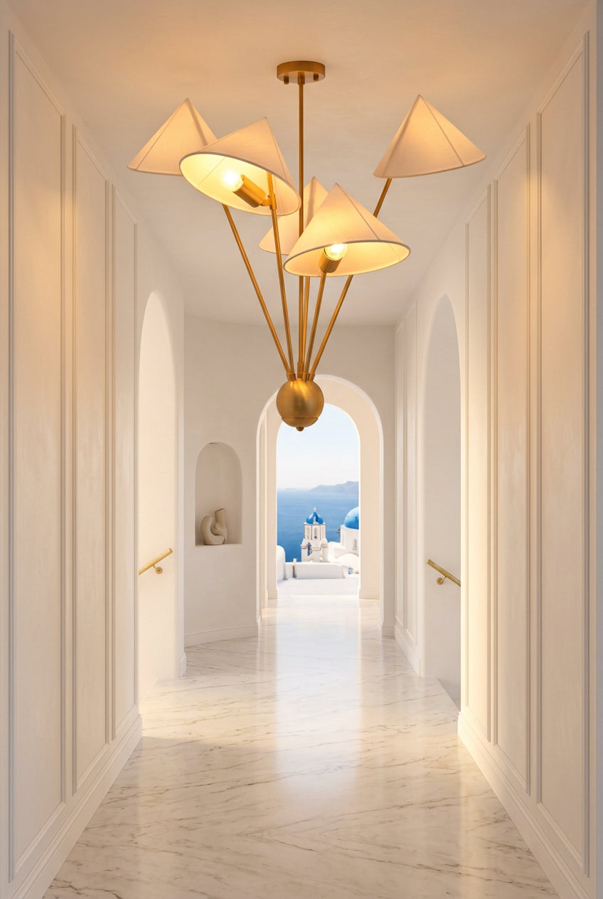 Mid century inspired brass chandelier with five fabric shades and asymmetrical multi-arm ceiling design