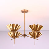 Side angle view of modern brass chandelier with fluted bowl shades and solid brass construction