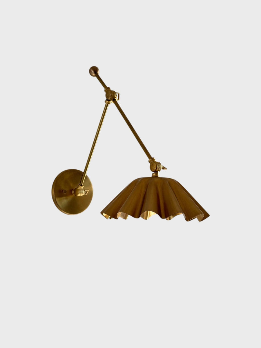 BRASS LEAF STUDIO scalloped brass swing arm wall sconce in brushed brass finish, front view on white background.