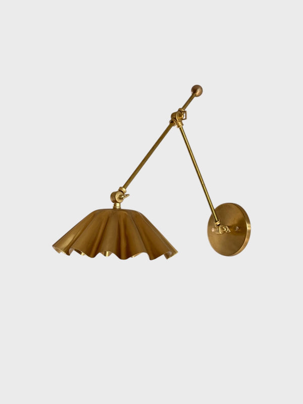 BRASS LEAF STUDIO scalloped brass swing arm wall sconce in brushed brass finish, front view on white background.