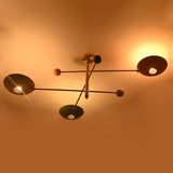 Sculptural brass flush mount ceiling light designed for dramatic indirect ceiling wash lighting