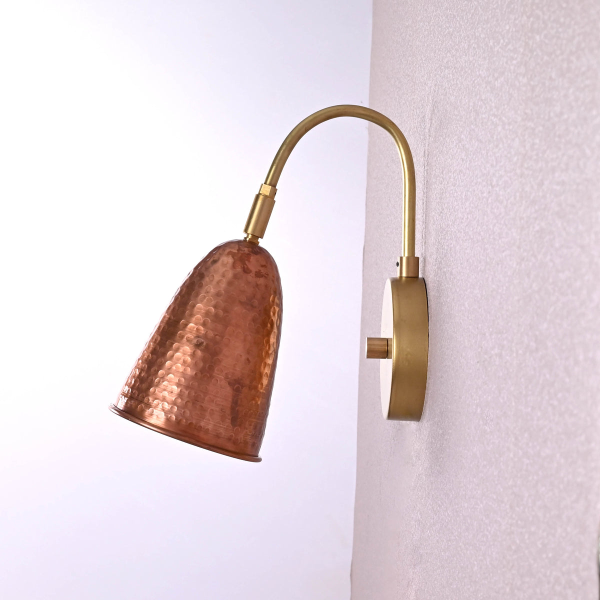 Side view of hammered copper and brass wall sconce – handmade industrial style wall light