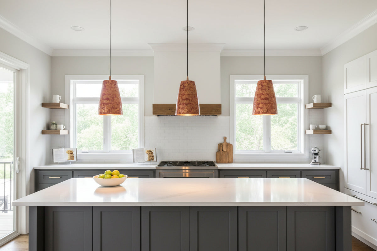 Single red copper pendant lamp with tapered patterned shade, black cord, and matching ceiling canopy on white background