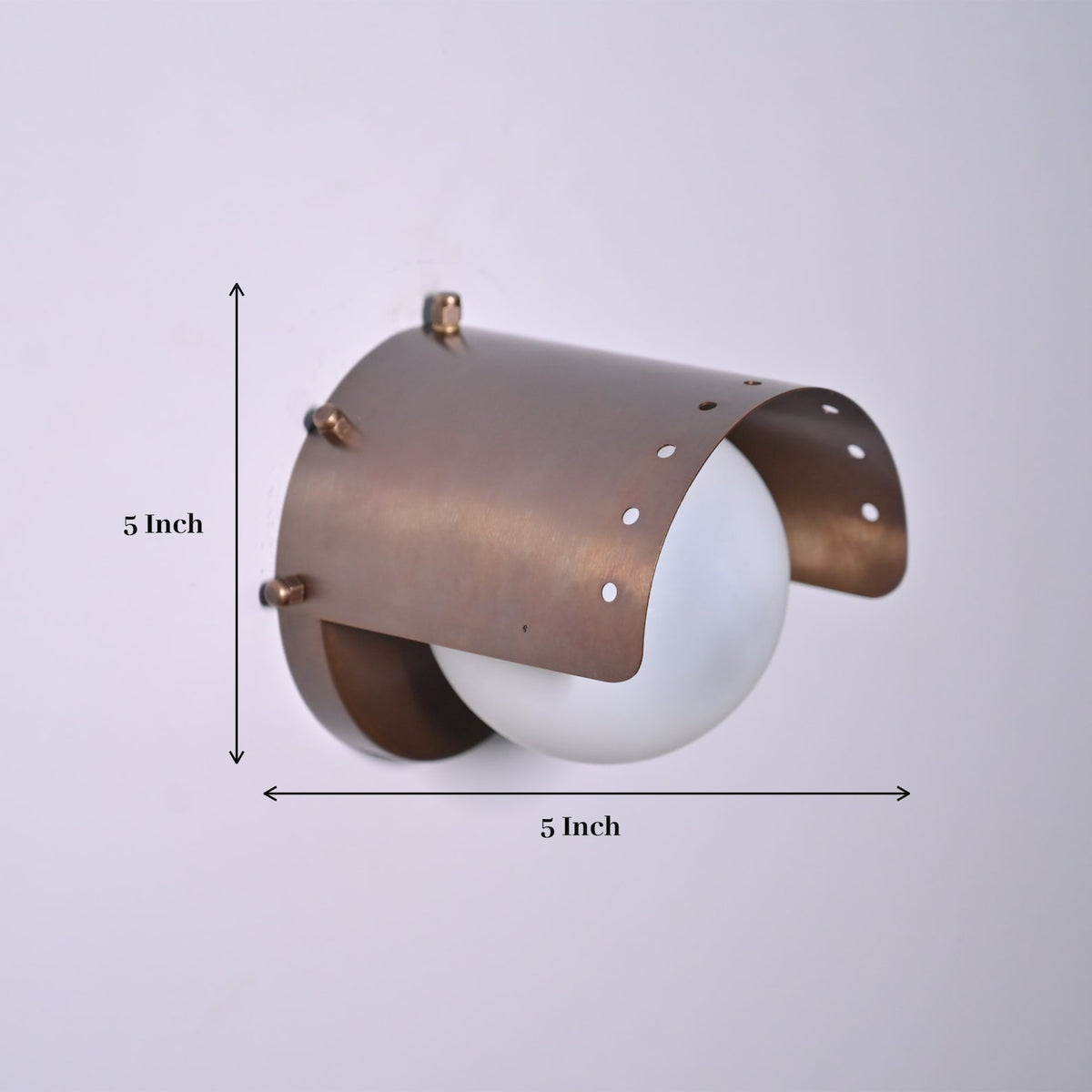 Compact 5-inch industrial brass wall light showing height and width dimensions for modern interior décor
