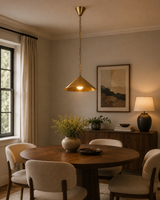 Solid brass chain pendant light with wide cone shade and matching ceiling canopy for modern interior lighting