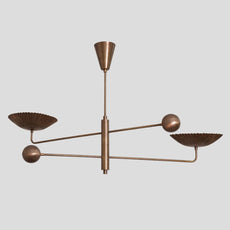 Solid brass chandelier with sculpted fluted bowl shades and minimalist linear arms, industrial-inspired handmade ceiling lamp.