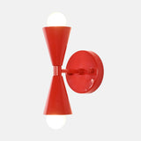 Solid brass red hourglass wall sconce with sculptural double cone shades and exposed globe bulbs