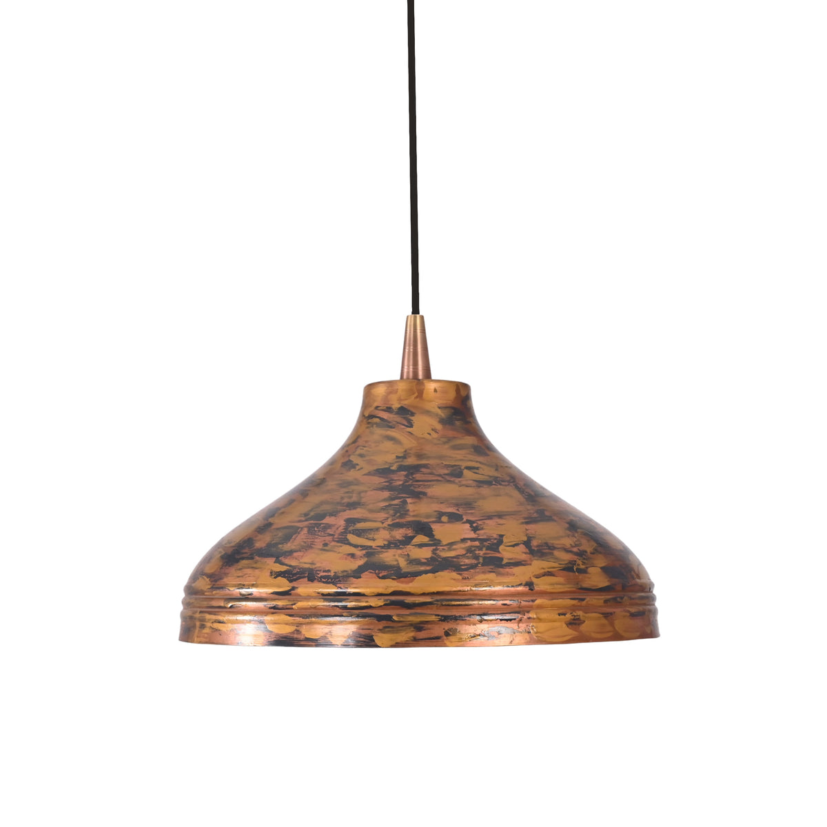 Closeup of solid copper pendant shade showing mottled artistic finish, rounded dome shape, and warm interior glow