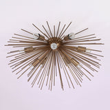 Mid century starburst flush mount chandelier crafted in solid brass with radial rod design