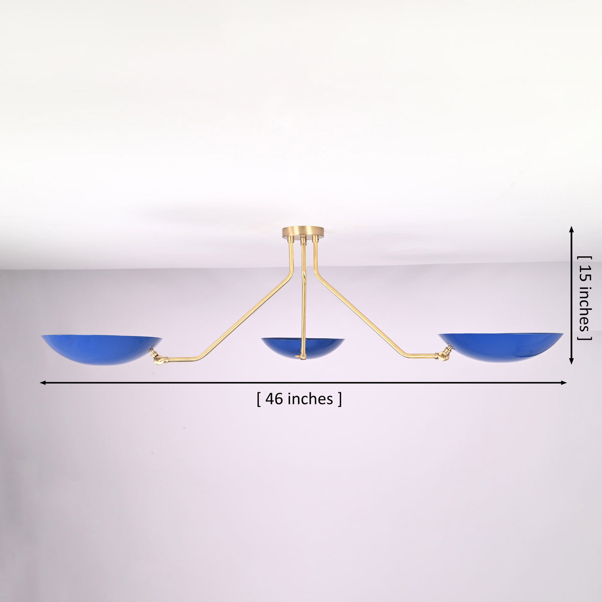 Three-light brass flush mount ceiling light with blue bowl shades showing 46 inch width and 15 inch height dimensions