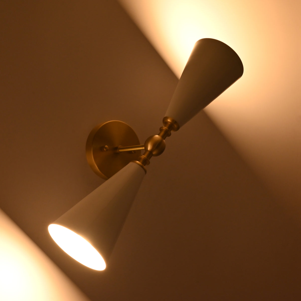 Up down wall sconce creating soft warm illumination above and below the fixture