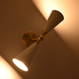 Up down wall sconce creating soft warm illumination above and below the fixture
