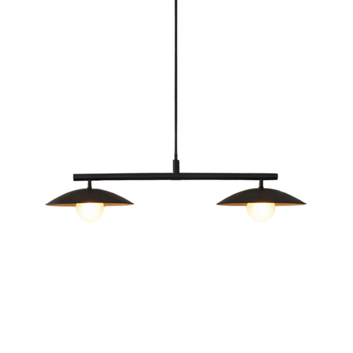 Front view of the Sutton linear pendant chandelier illuminated with warm globe bulbs beneath dual matte black dome shades and a sleek horizontal bar.