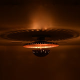 Close view of Valencia flush mount showing copper finish, perforated detailing and layered sculptural form