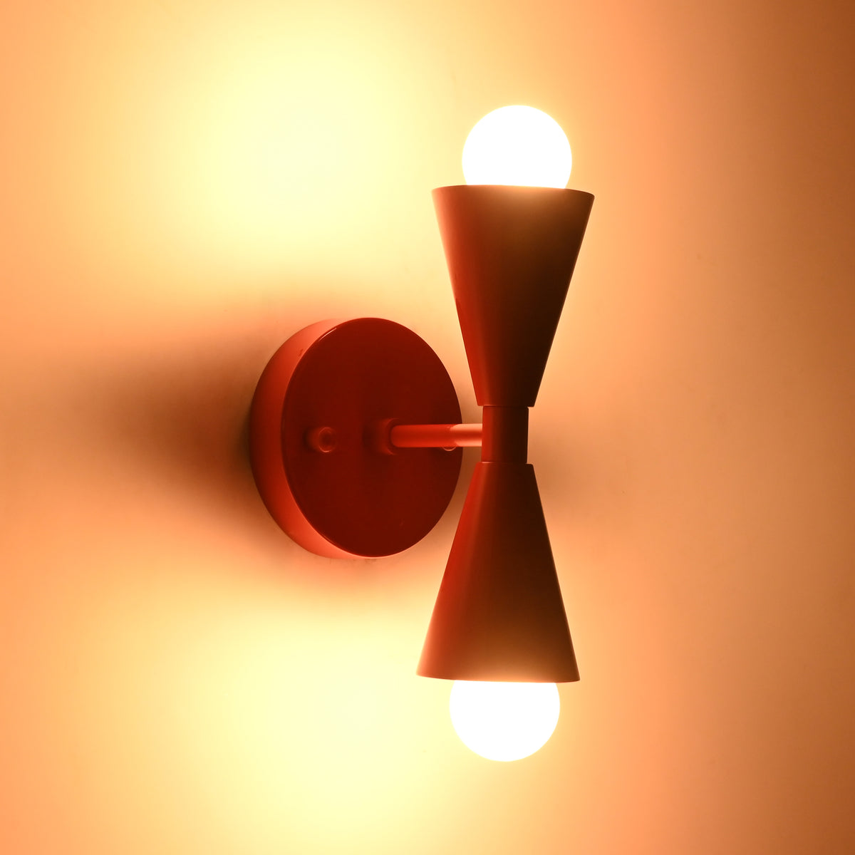 Vera Red wall sconce showing 6 inch width and 8 inch height with cone shade design