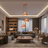 Verona hammered copper cluster pendant with three cascading shades and warm downward glow – Model 33221