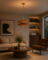 Verona Layered Disc Pendant Chandelier 24 Inch Model 33253 installed in a modern living room, showcasing warm indirect ambient lighting and a sculptural contemporary design.