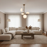 Verona Sculptural Globe Chandelier with brass tone frame and four opal glass shades – side view – Model 33167