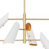 Center detail of white cone chandelier with brushed brass arms and warm reflective interiors