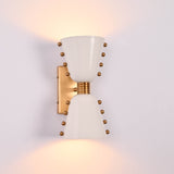White diabolo wall light shown illuminated with soft upward and downward lighting effect