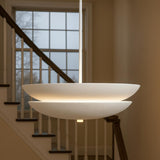 Contemporary white layered disc style pendant chandelier providing soft indirect ceiling lighting